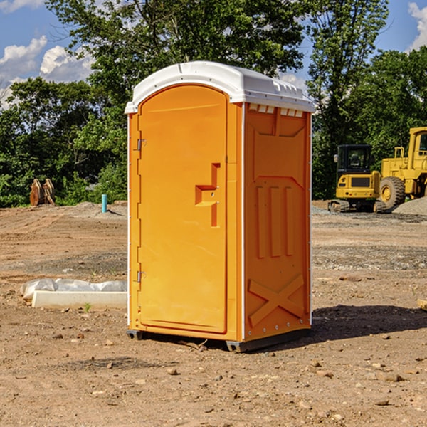 what is the cost difference between standard and deluxe portable restroom rentals in New Castle